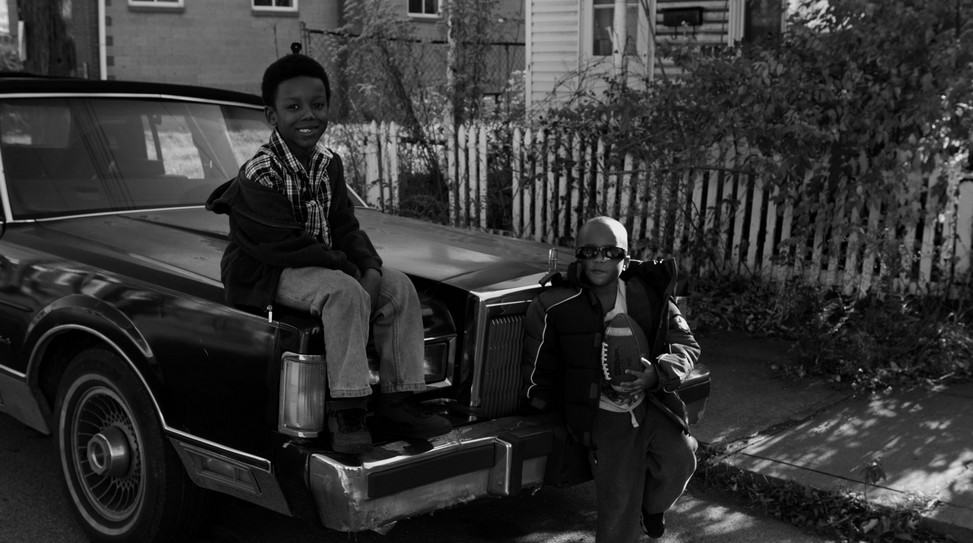 Jarrell and friend on car